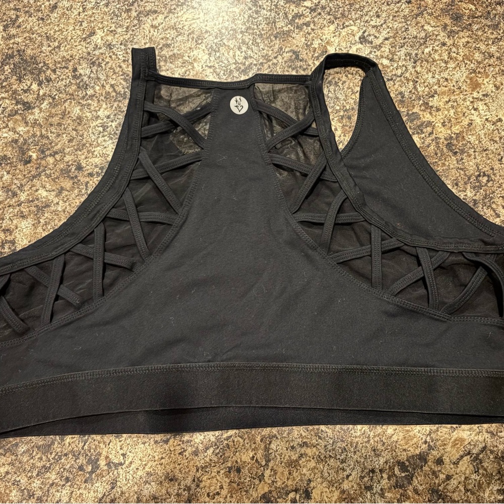 Two torrid Black Sports Bras -one mesh and one plain black- read description